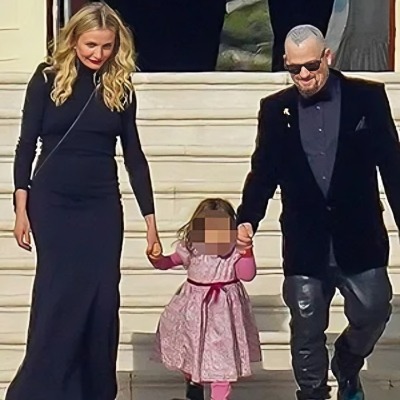 The American musician Benji Madden and his spouse Cameron Diaz holded hands of their daughter.